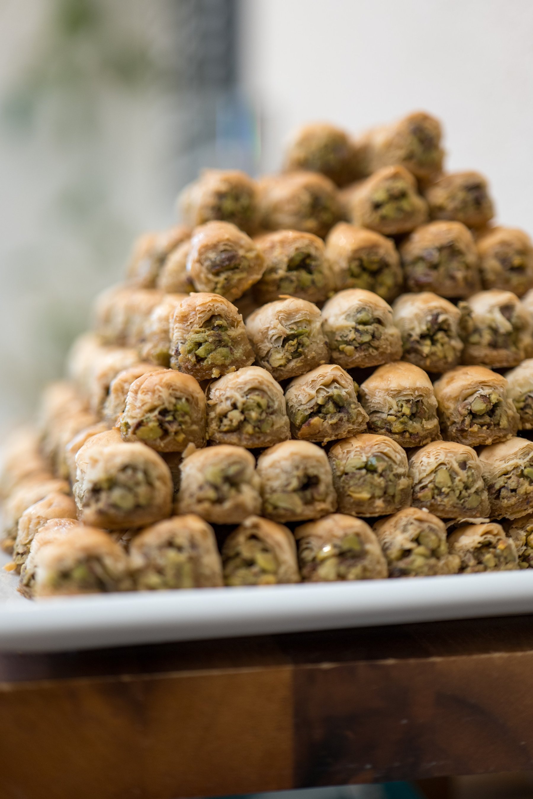 A pyramid of baklava on a serving plate