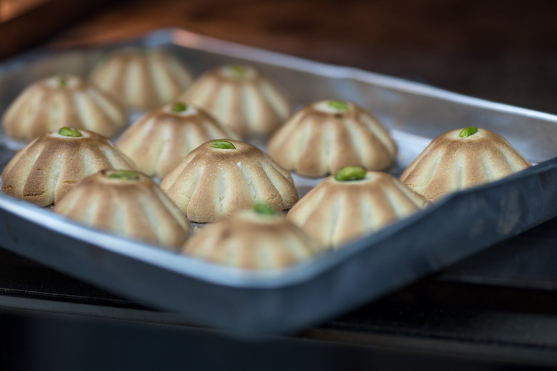 A tray of ghreybeh biscuits filled with ashta cream