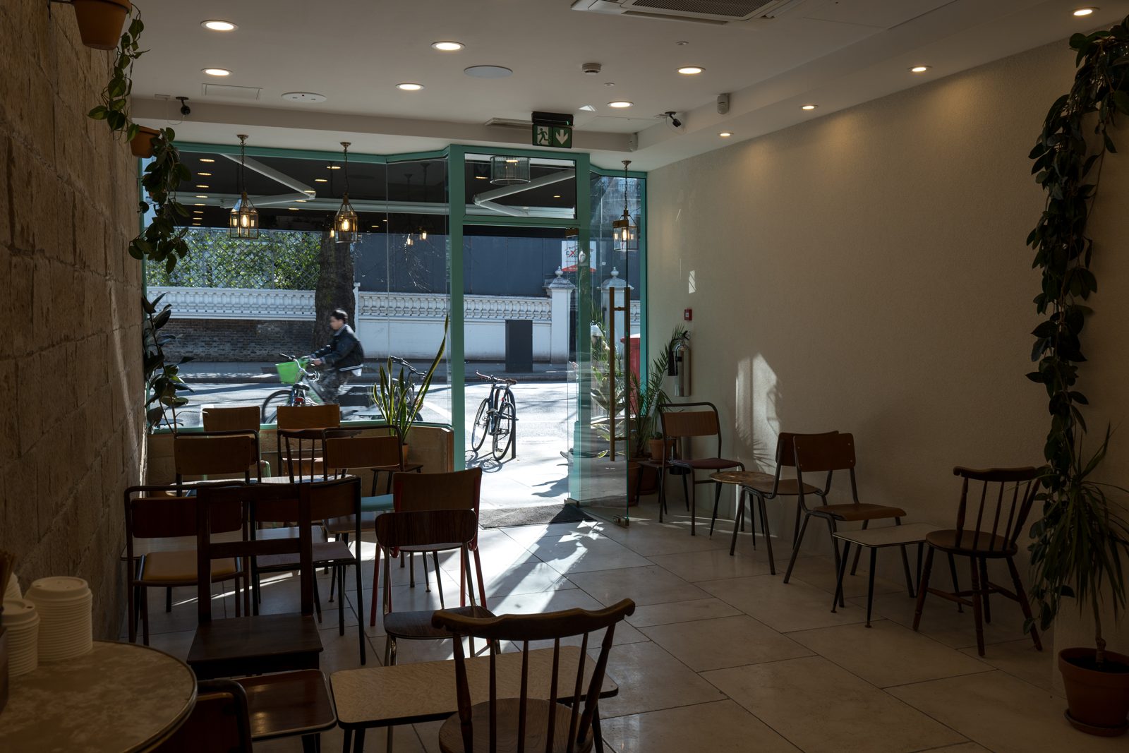 Sunlight through the front window onto the café tables
